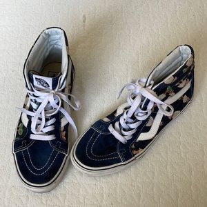 Van’s high top hola girl shoes.